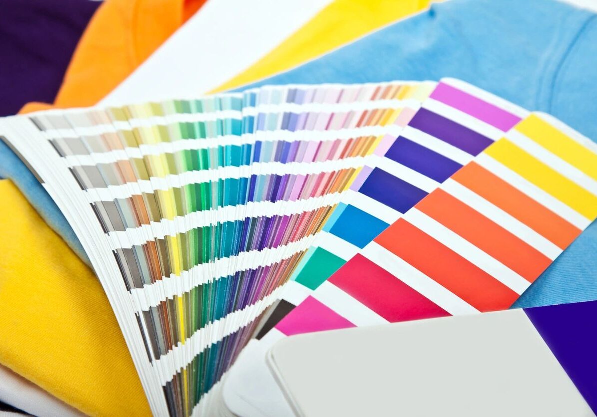 Color swatches and fabric samples in display.